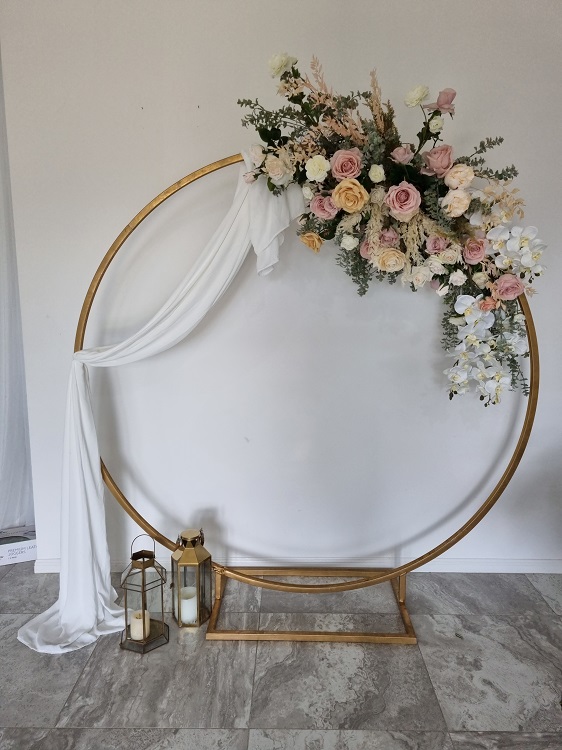 Round Gold Frame with draping and artificial floral package
