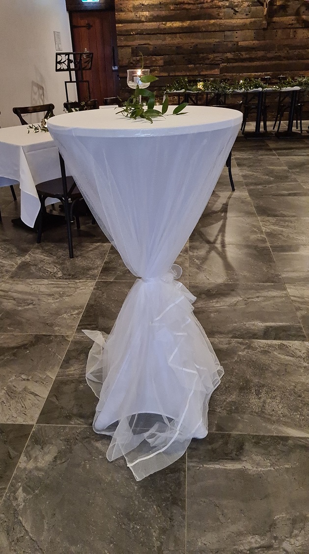 White Tuelle like overlay for high dry bar table with ties